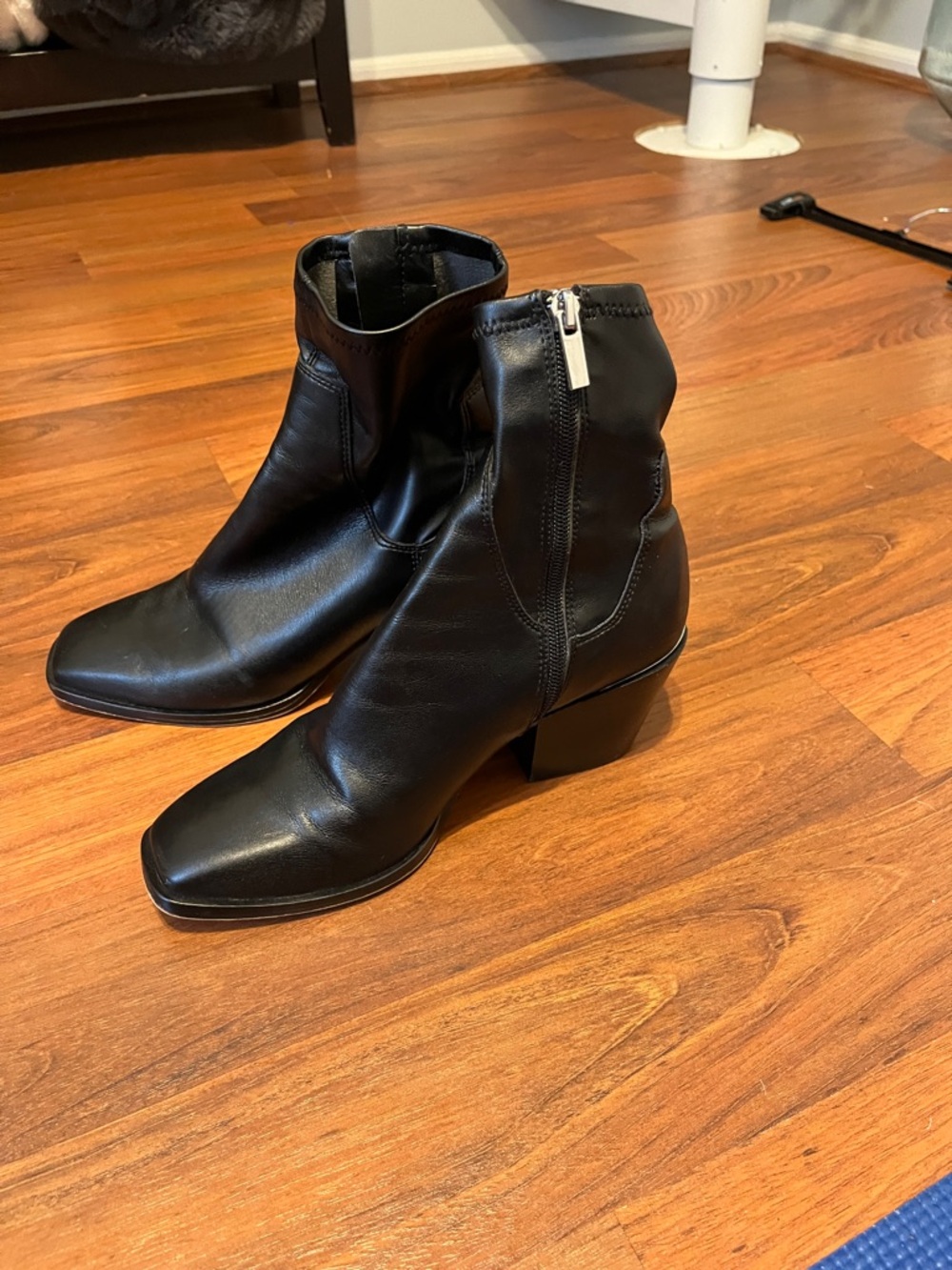Dolce Vita Women’s Black Leather Ankle Boots with Side Zip and silver embellish